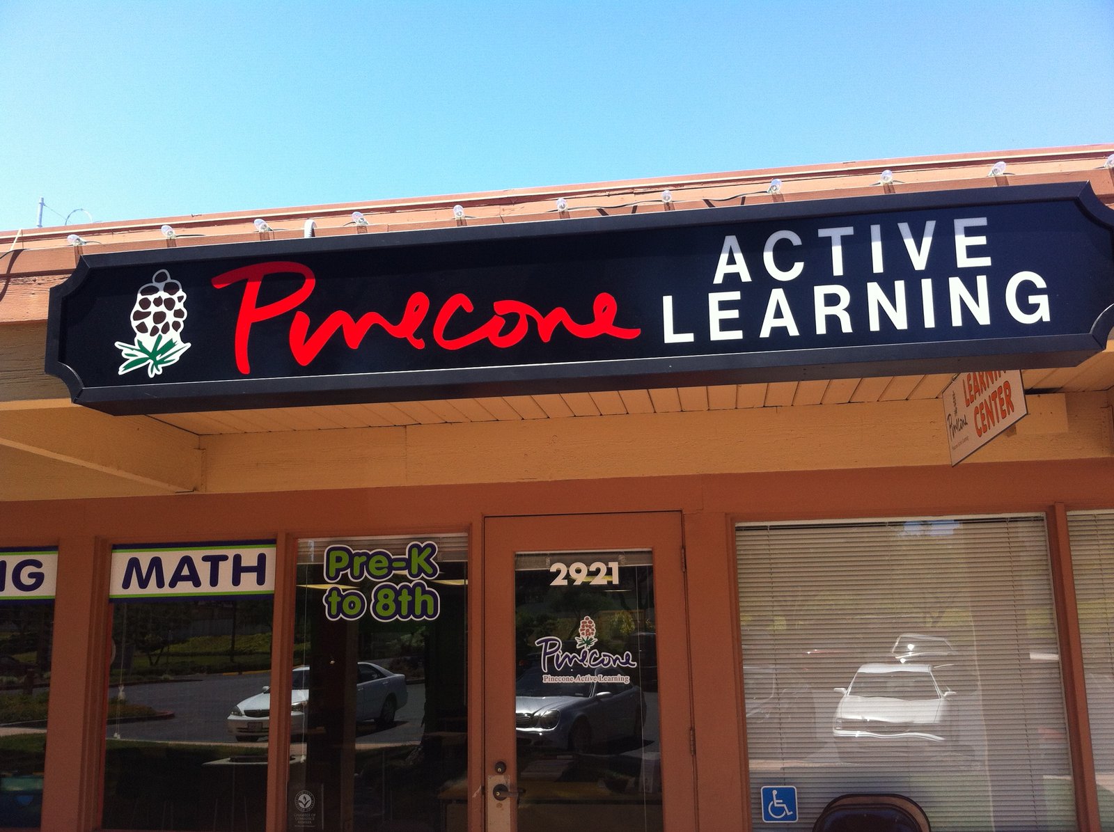Pinecone Active Learning storefront at 2921 The Villages Parkway in San Jose, with signage visible from the plaza parking lot