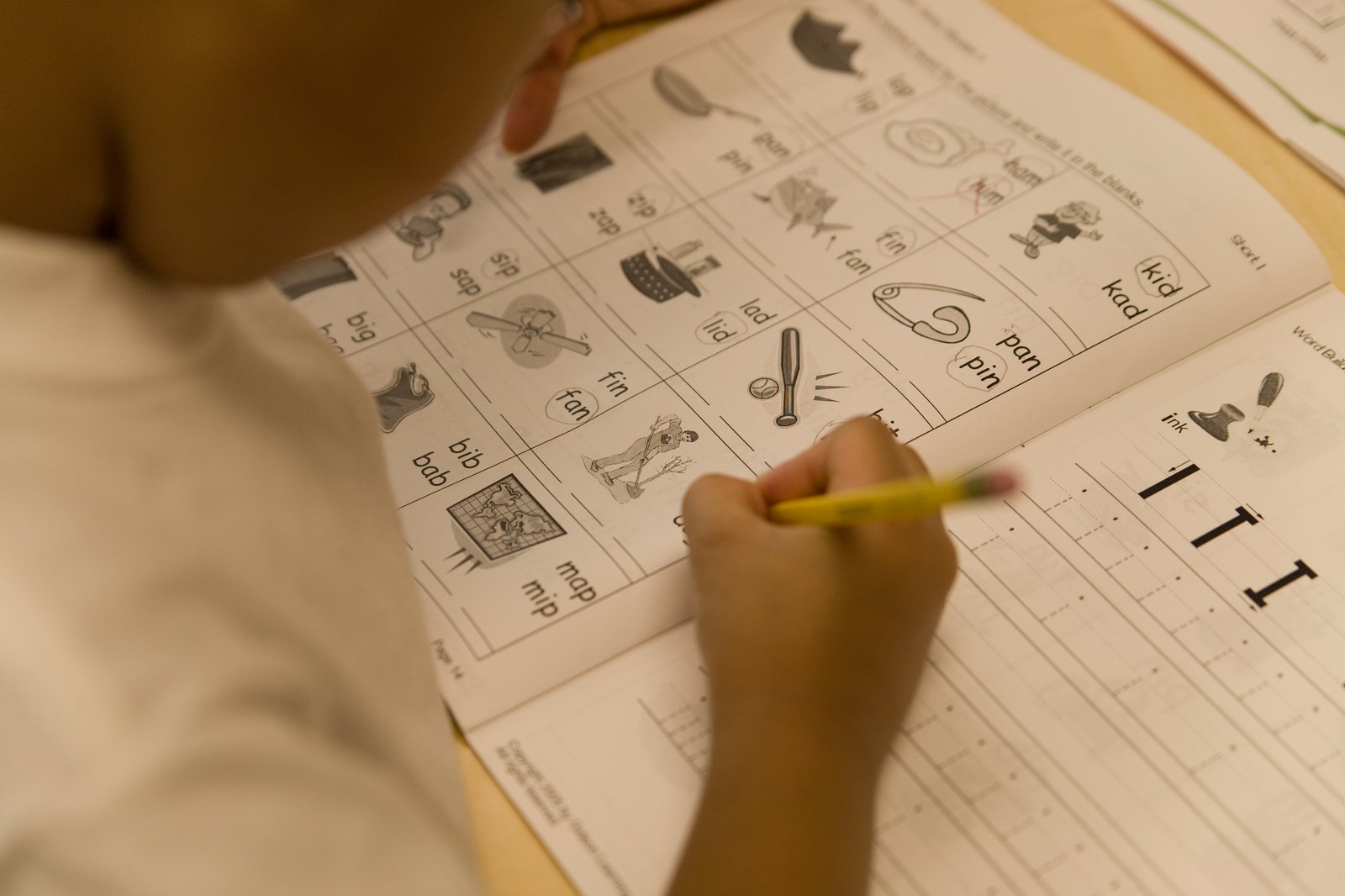 Young Pinecone Active Learning student practicing sentence-level writing at the San Jose learning center